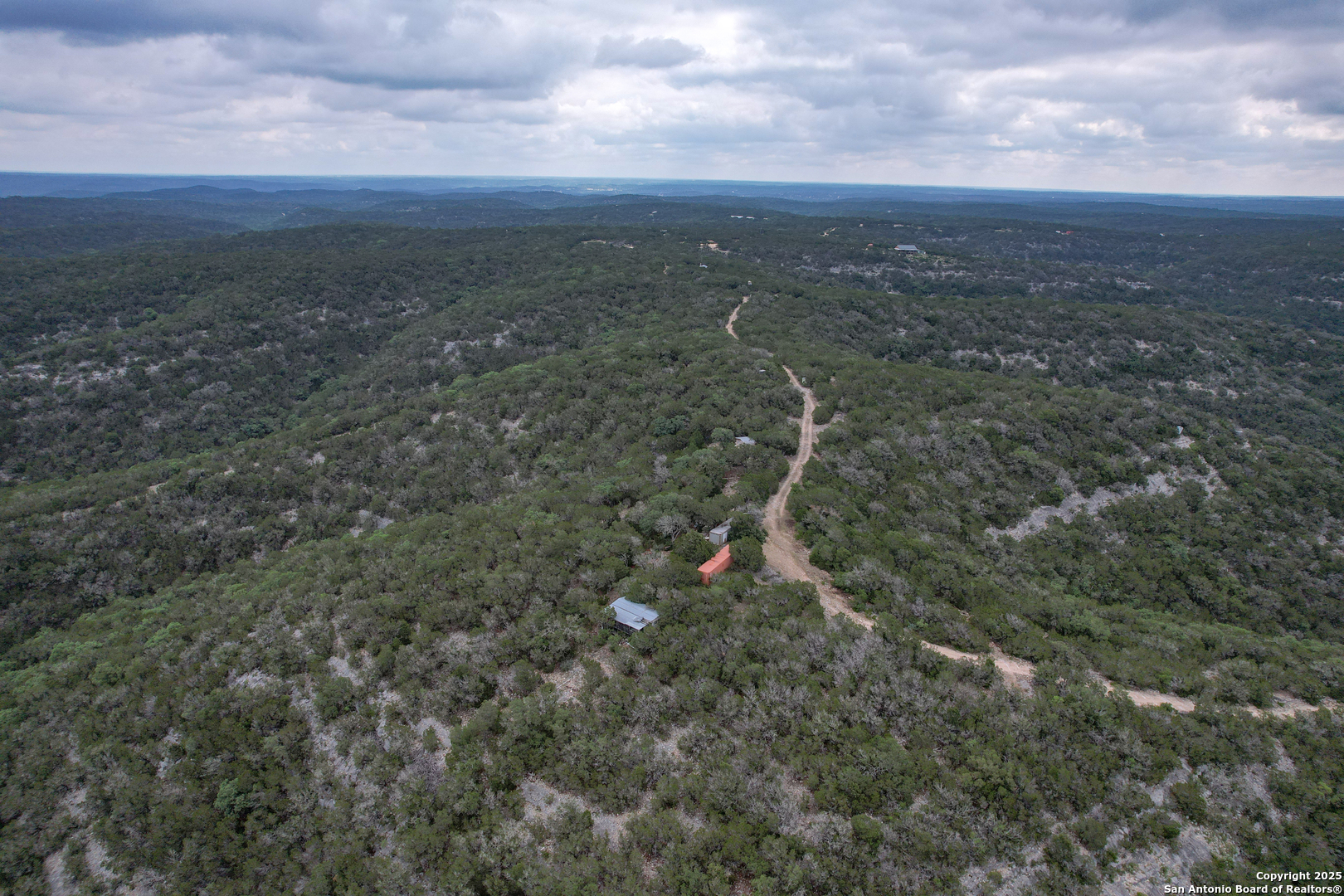 824 South Pinon Loop Camp Wood, TX 78833 - Photo 6 of 39 a view of a city with lush green forest