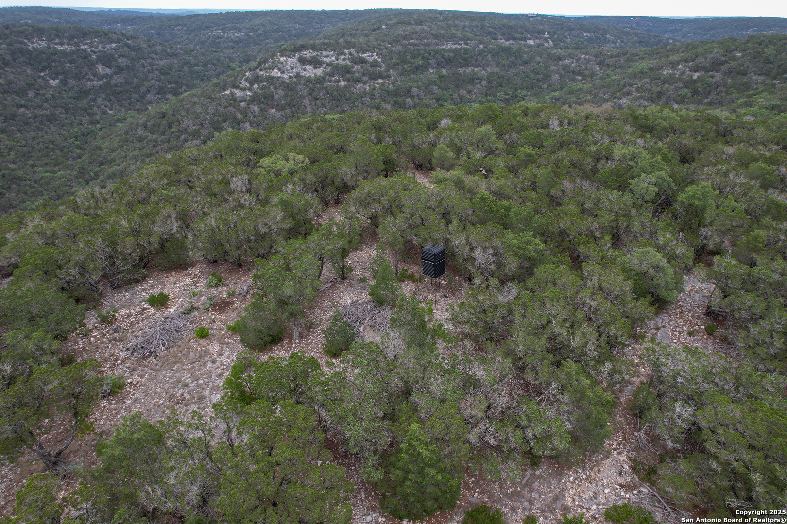 824 South Pinon Loop Camp Wood, TX 78833 - Photo 8 of 39 a view of a city with lush green forest