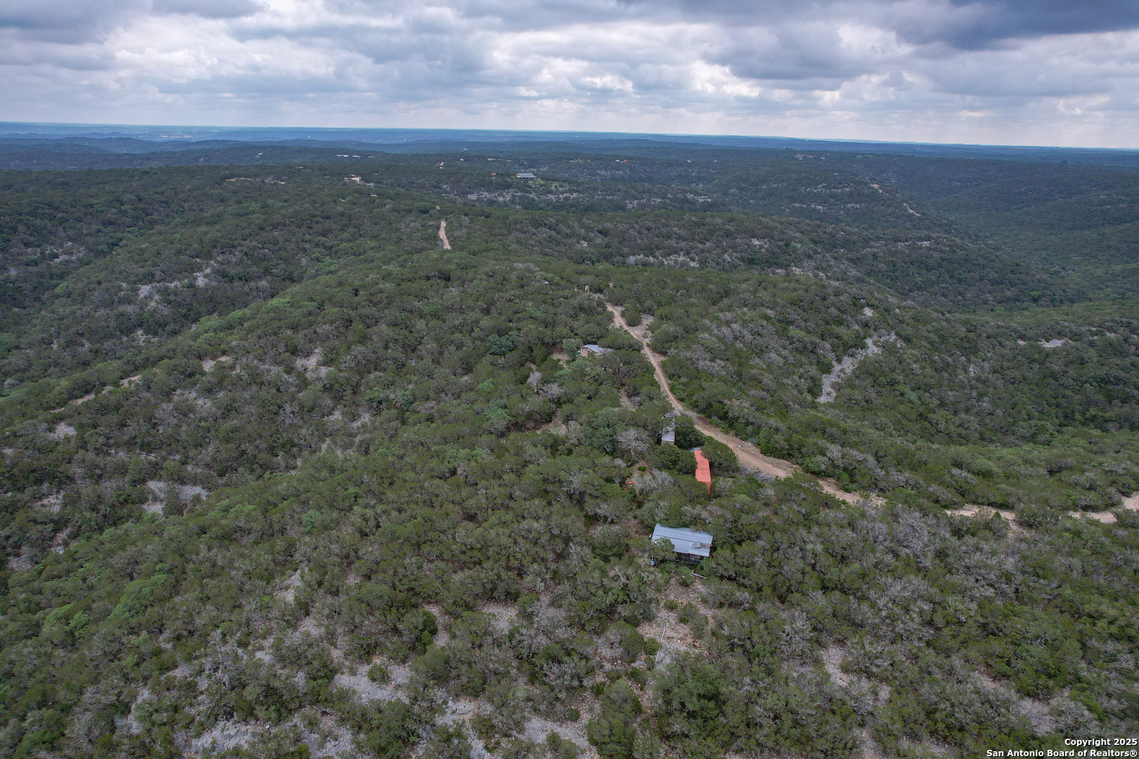 824 South Pinon Loop Camp Wood, TX 78833 - Photo 10 of 39 a view of a city with lush green forest
