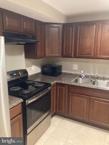 a bedroom with a white bed