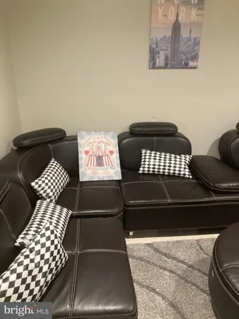 a black and white photo of a couch