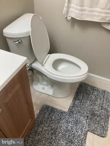 a bedroom with a white bed