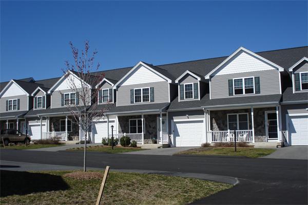 159 Allen Road, Unit 4 Billerica, MA 01821 - Photo 1 of 8 a front view of a house with a yard
