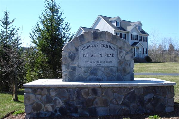 159 Allen Road, Unit 4 Billerica, MA 01821 - Photo 2 of 8 a sign on the side of a road