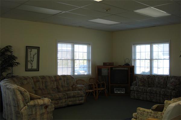 159 Allen Road, Unit 4 Billerica, MA 01821 - Photo 8 of 8 a living room with furniture and a window
