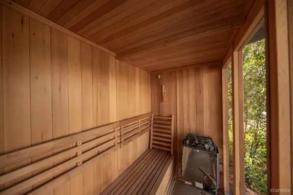 a view of a balcony with wooden floor and stairs