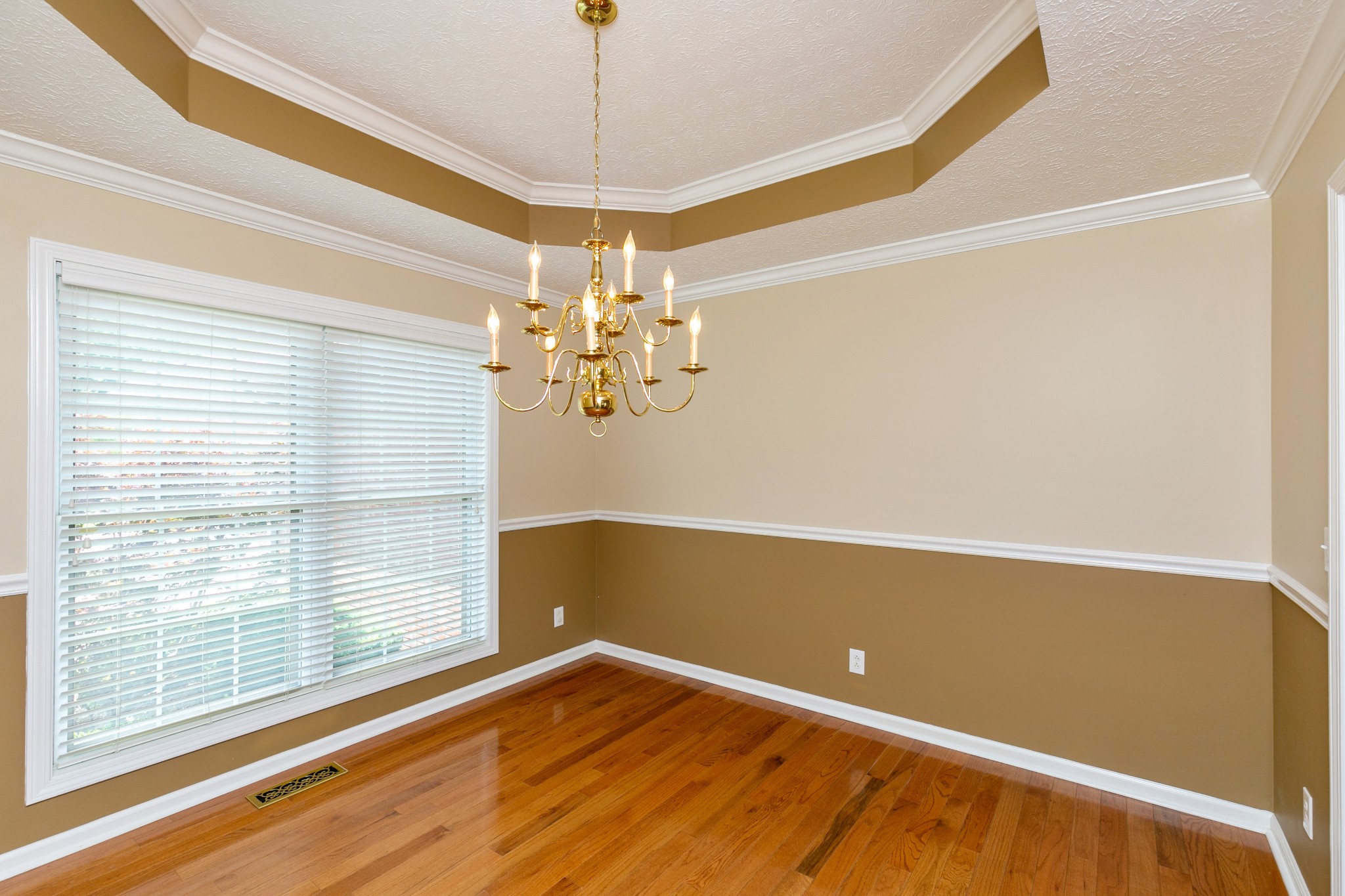 121 Foxrun Springfield, TN 37172 - Photo 8 of 36 a view of empty room with wooden floor and fan