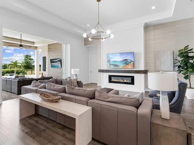 a view of a dining room with furniture and window