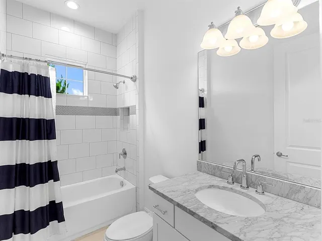 a kitchen with a stove and cabinets