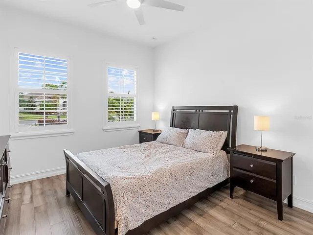 a view of a backyard with sitting area