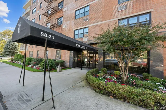 a view of a chairs and table in a patio