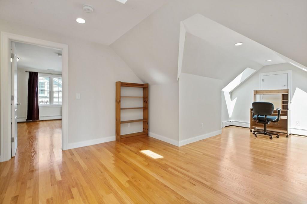 31 Fuller Road Needham, MA 02492 - Photo 29 of 42 a view of a livingroom with furniture and an empty room