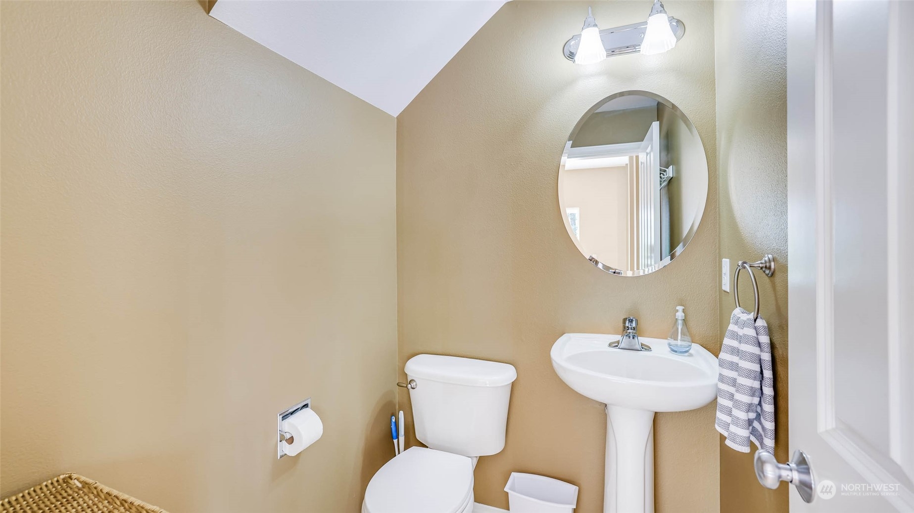 28120 Maple Ridge Way Southeast Maple Valley, WA 98038 - Photo 16 of 36 a bathroom with a toilet sink and mirror