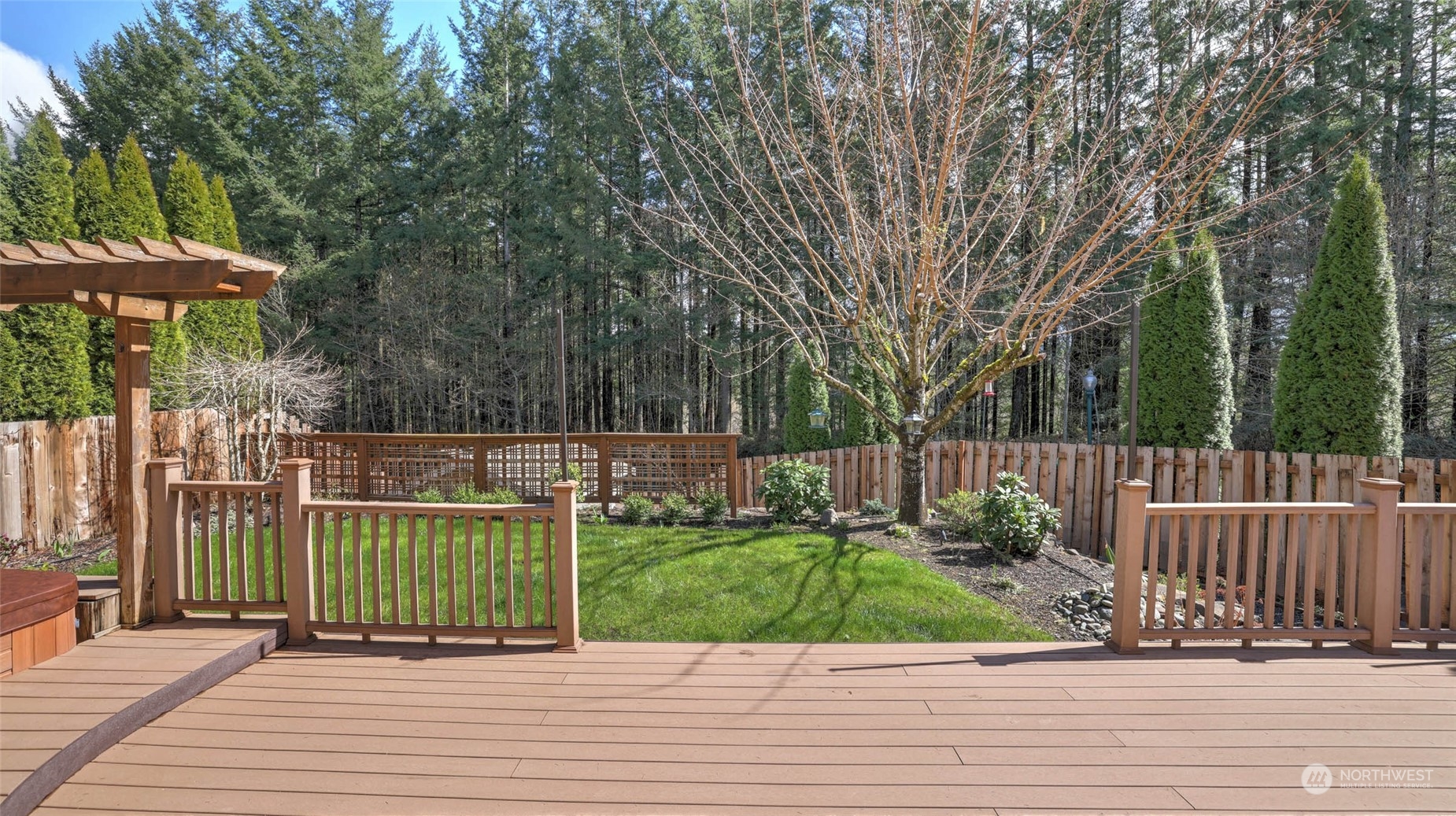 28120 Maple Ridge Way Southeast Maple Valley, WA 98038 - Photo 26 of 36 a view of a deck with a backyard