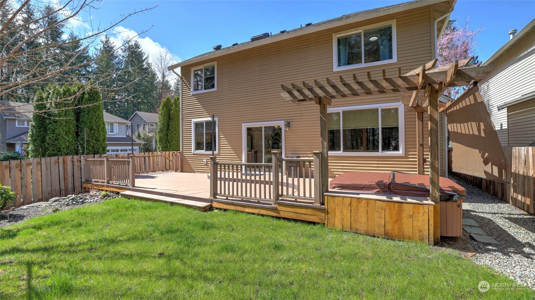 28120 Maple Ridge Way Southeast Maple Valley, WA 98038 - Photo 29 of 36 a view of a house with a yard and furniture