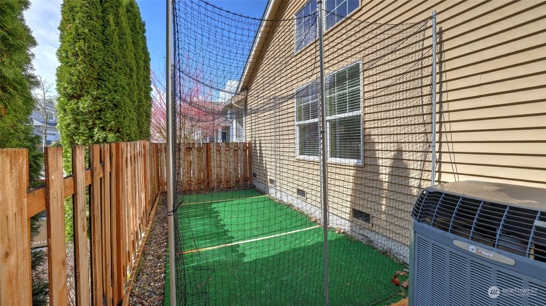28120 Maple Ridge Way Southeast Maple Valley, WA 98038 - Photo 30 of 36 a view of a backyard with a garden