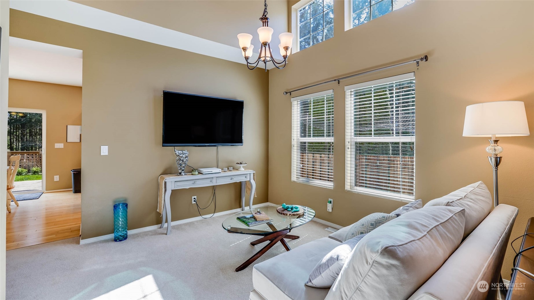 28120 Maple Ridge Way Southeast Maple Valley, WA 98038 - Photo 5 of 36 a living room with furniture and a flat screen tv