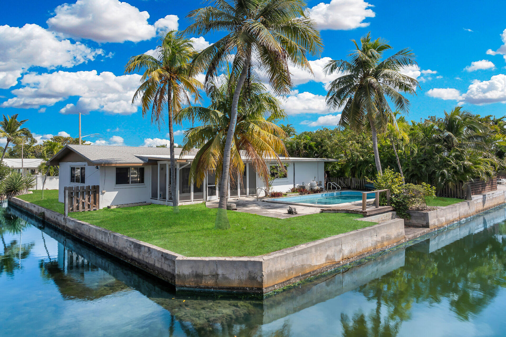 1600 Bahama Drive Key West, FL 33040 - Photo 11 of 41 a view of a house with swimming pool and a yard