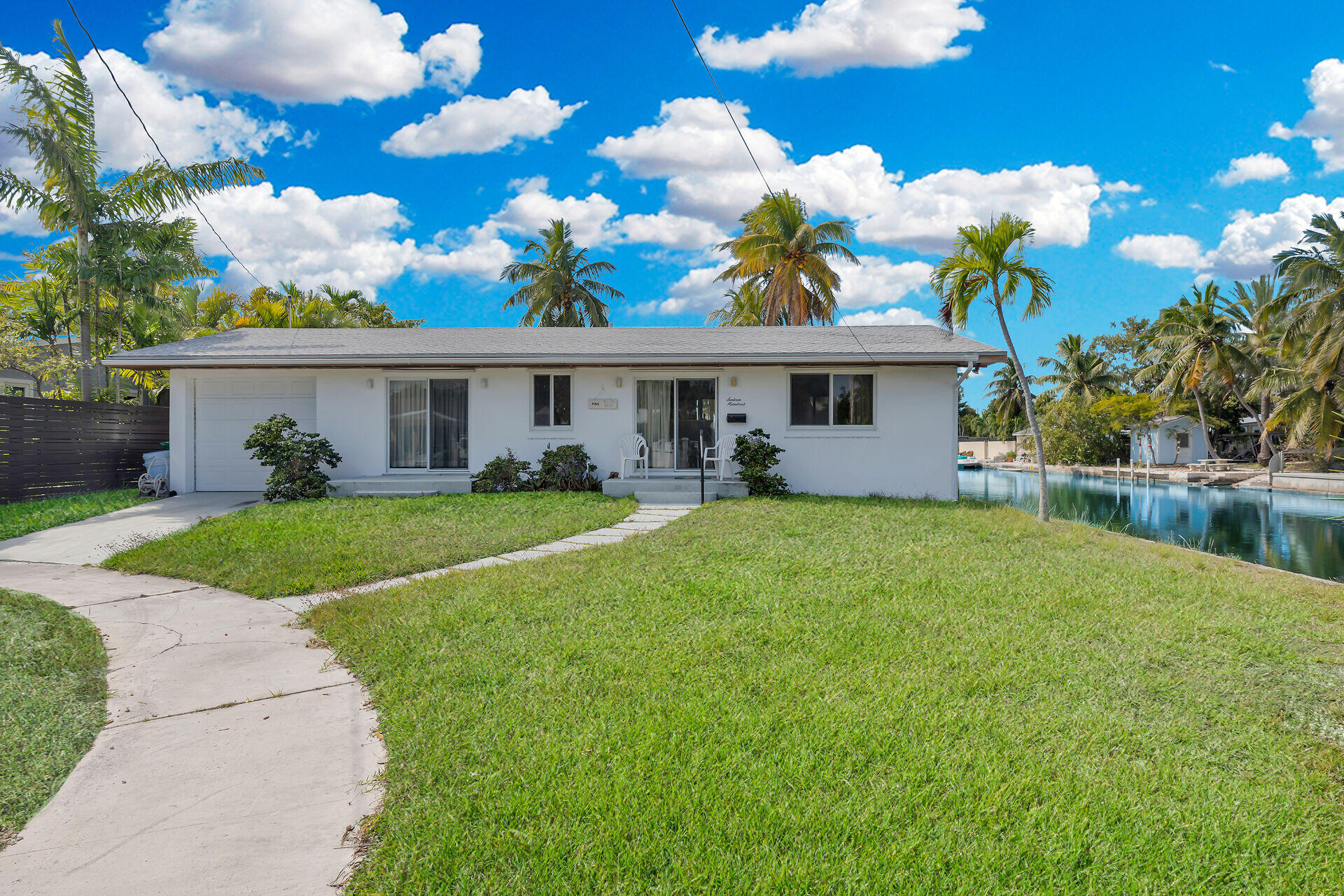 1600 Bahama Drive Key West, FL 33040 - Photo 15 of 41 a front view of a house with garden
