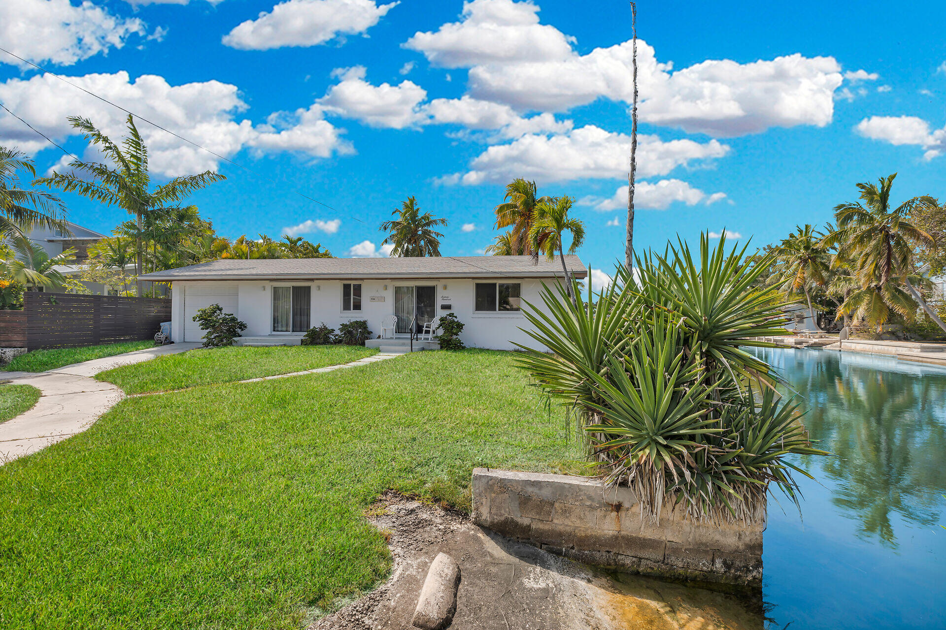 1600 Bahama Drive Key West, FL 33040 - Photo 16 of 41 a view of a house with a backyard