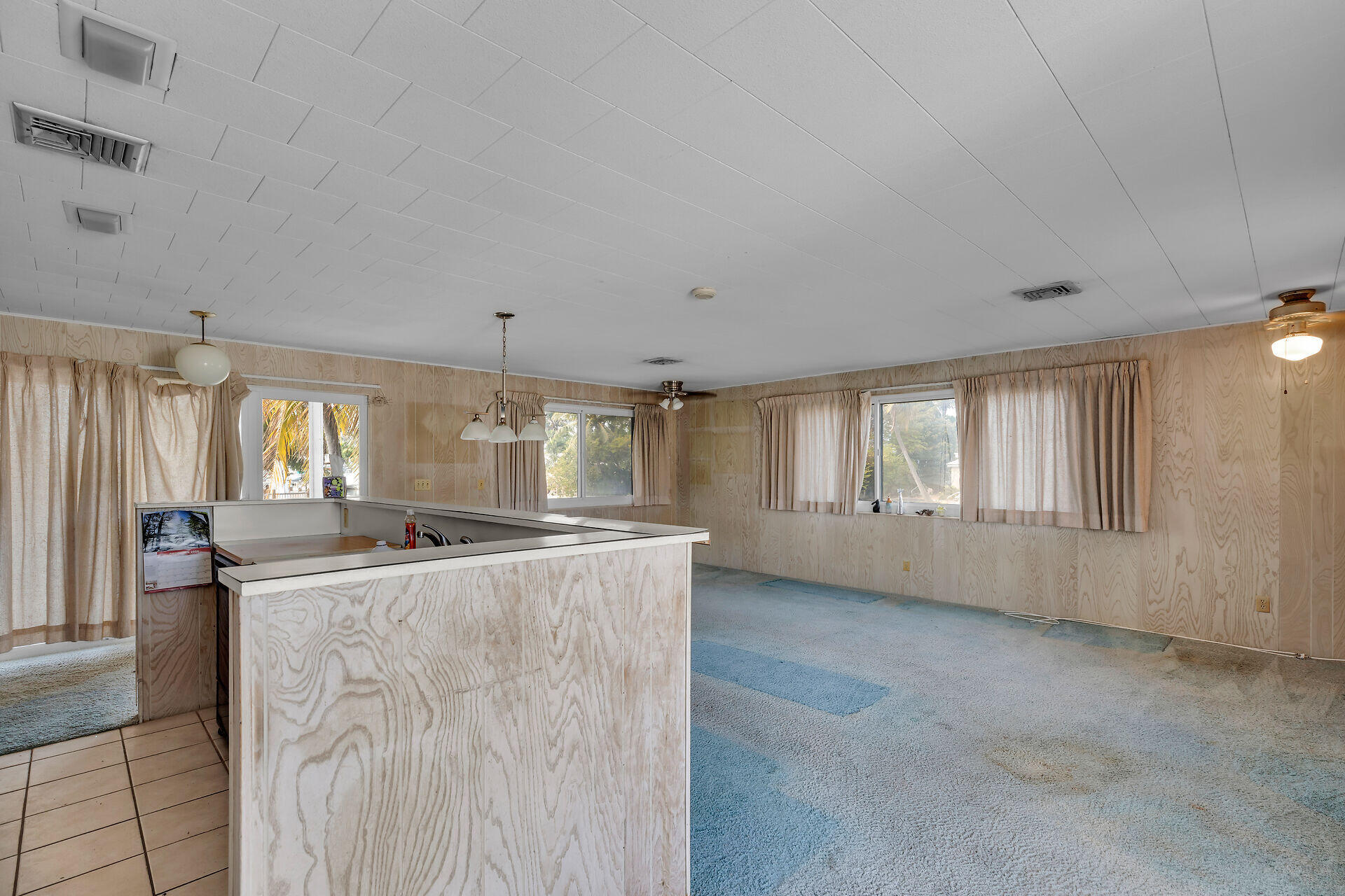 1600 Bahama Drive Key West, FL 33040 - Photo 18 of 41 a kitchen with stainless steel appliances granite countertop a sink stove and refrigerator