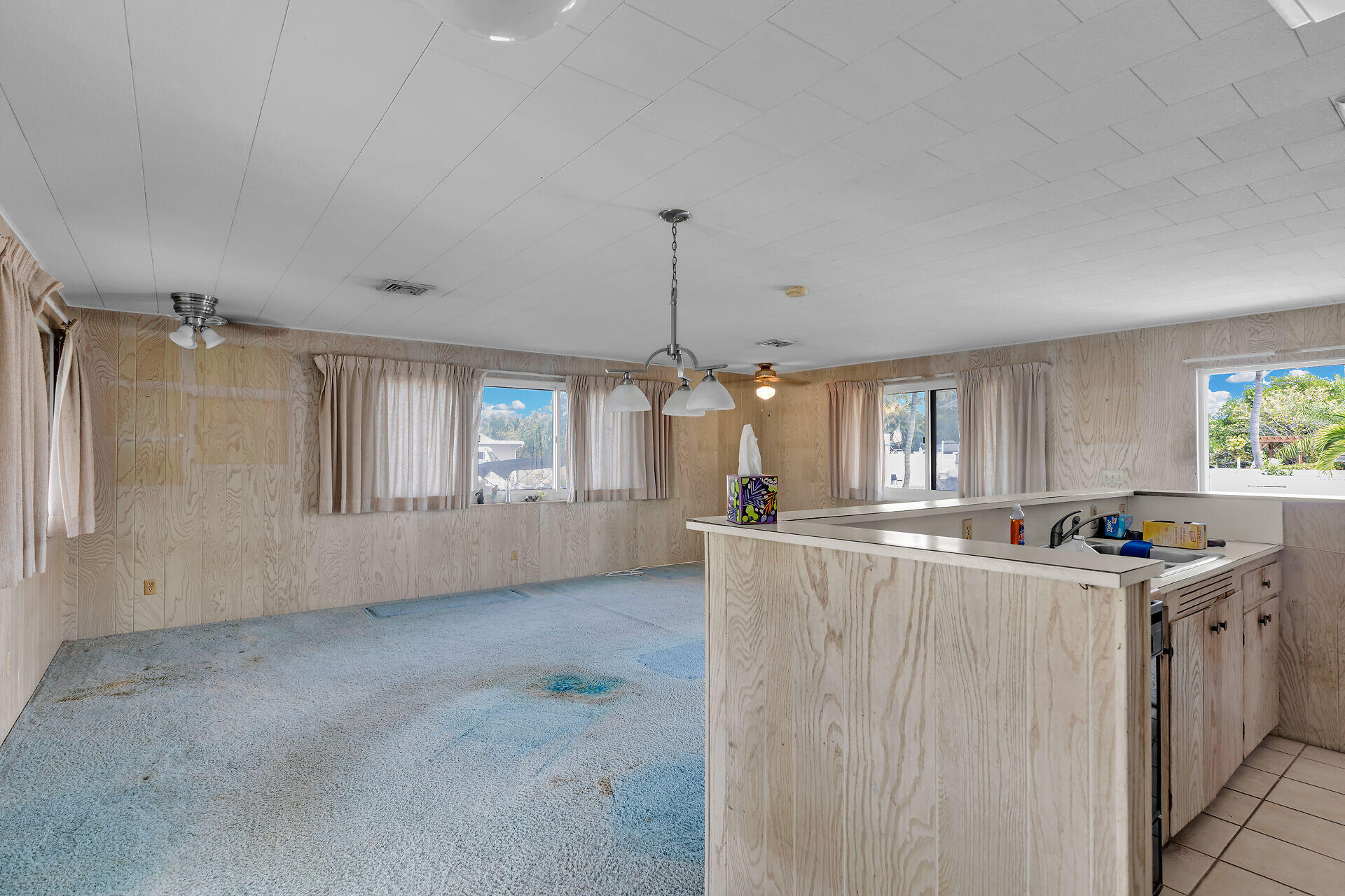 1600 Bahama Drive Key West, FL 33040 - Photo 21 of 41 a kitchen with granite countertop a sink and cabinets