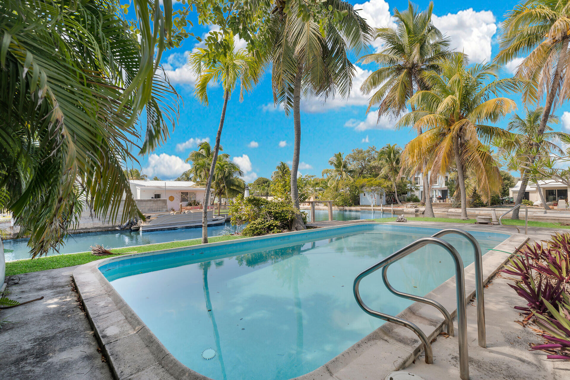 1600 Bahama Drive Key West, FL 33040 - Photo 35 of 41 a swimming pool with outdoor seating and yard