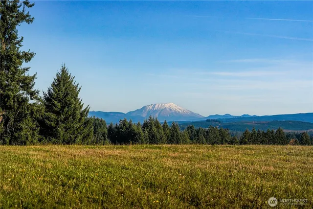 a view of an outdoor space and mountains