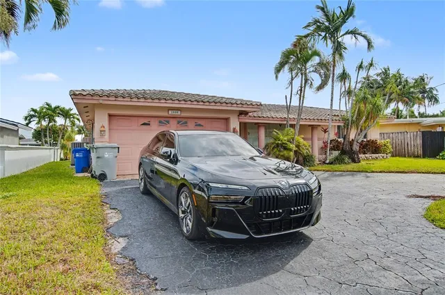 a house view with a garden space