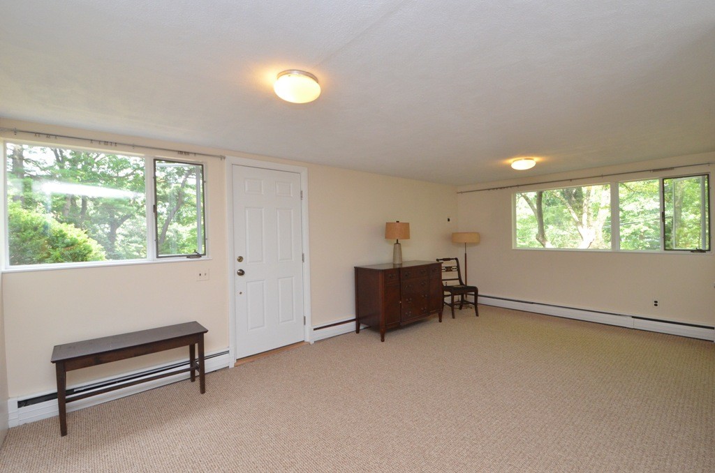 39 Peacock Farm Road Lexington, MA 02421 - Photo 20 of 30 an empty room with windows
