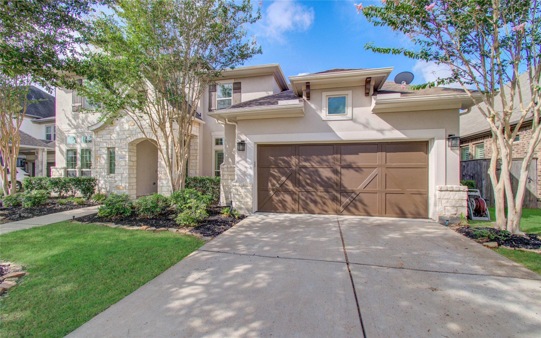 28627 Rolling Ridge Drive Katy, TX 77494 - Photo 10 of 44 a front view of a house with garden
