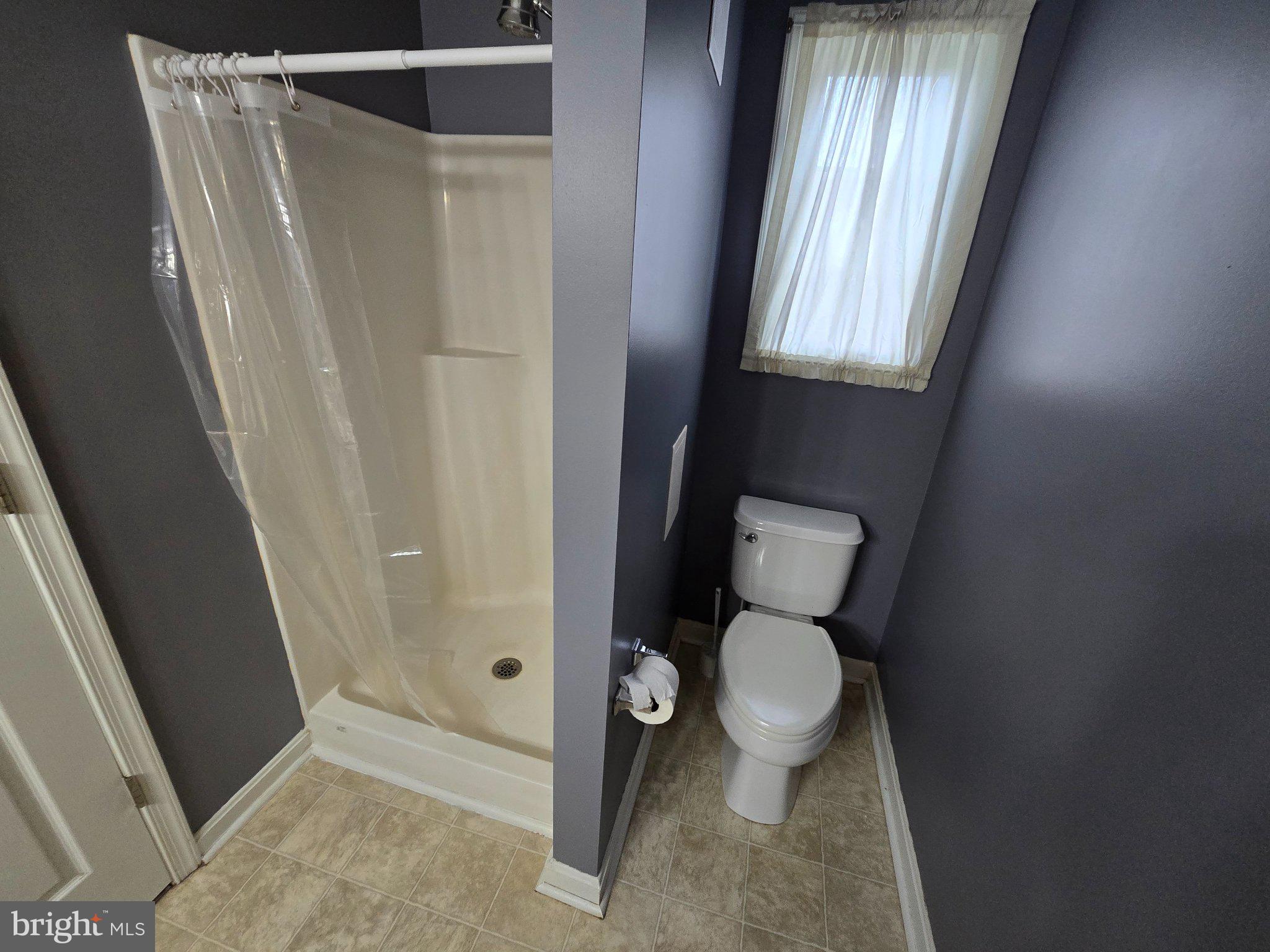 8981 Sharptown Road Laurel, DE 19956 - Photo 23 of 34 Modern bathroom with sleek design.