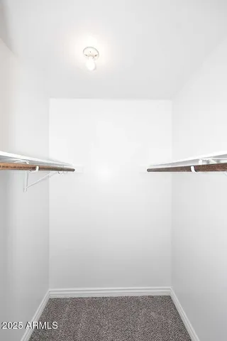 a view of small space with racks on the wall