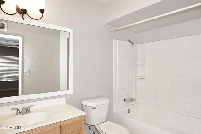 a bathroom with a sink a toilet and a bathtub