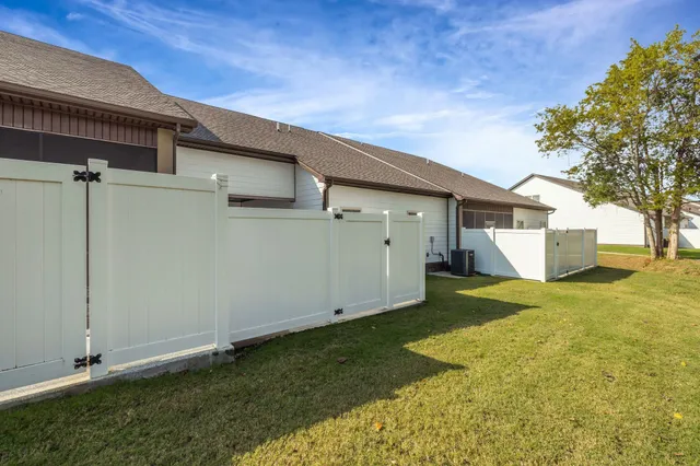 a view of a backyard with garage