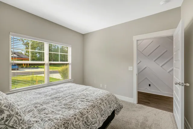 a view of a room with a large window