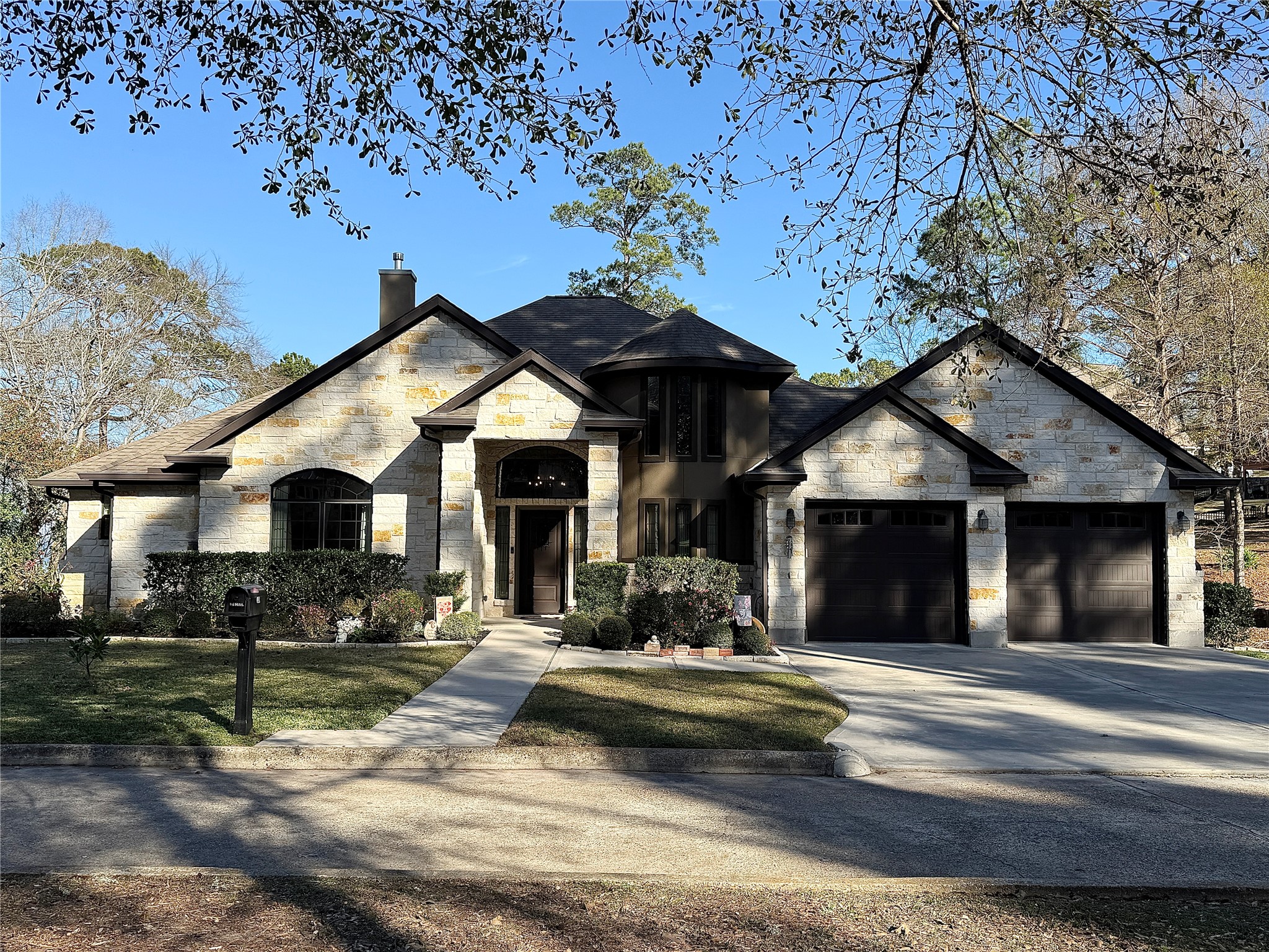 200 Harbor Run Drive Coldspring, TX 77331 - Photo 1 of 50 a front view of a house with a yard