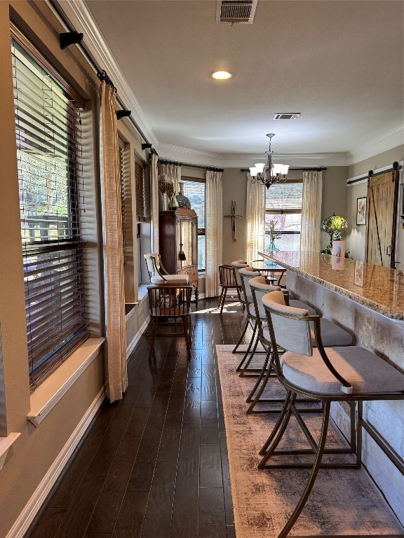 200 Harbor Run Drive Coldspring, TX 77331 - Photo 11 of 50 There is a wall of windows bringing natural light into the living, kitchen, and dining rooms. :)