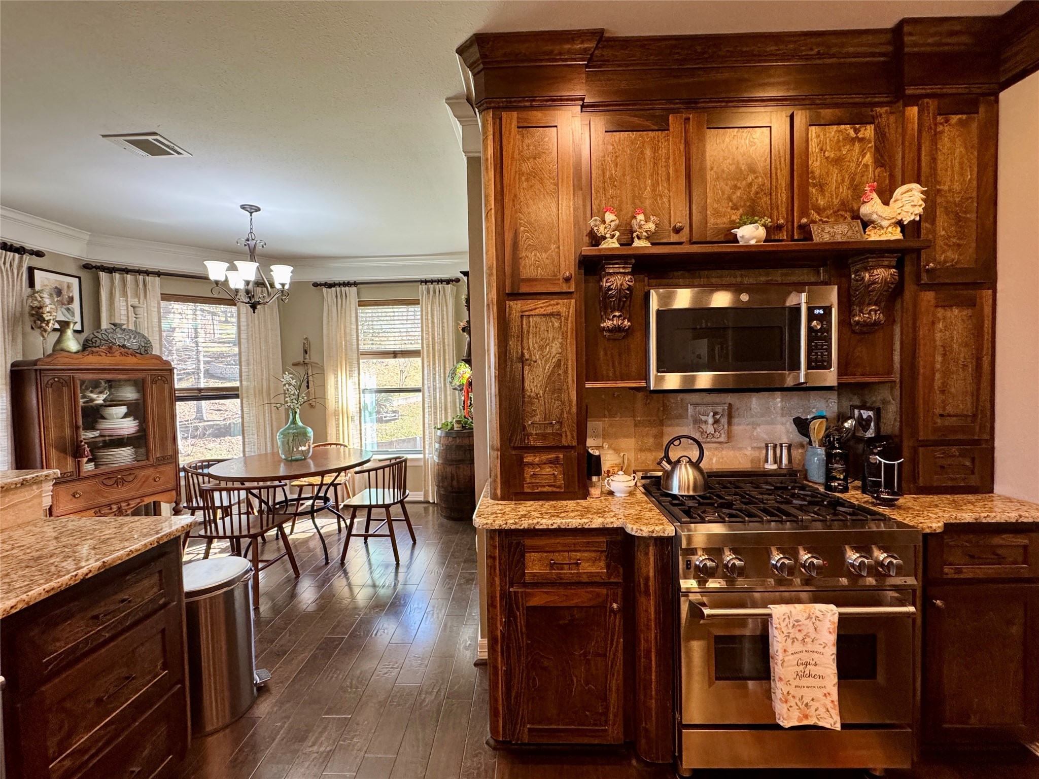 200 Harbor Run Drive Coldspring, TX 77331 - Photo 13 of 50 This inviting kitchen backs to a wall of windows that let in natural light. If I were going to give this home a name, I would call it serenity.