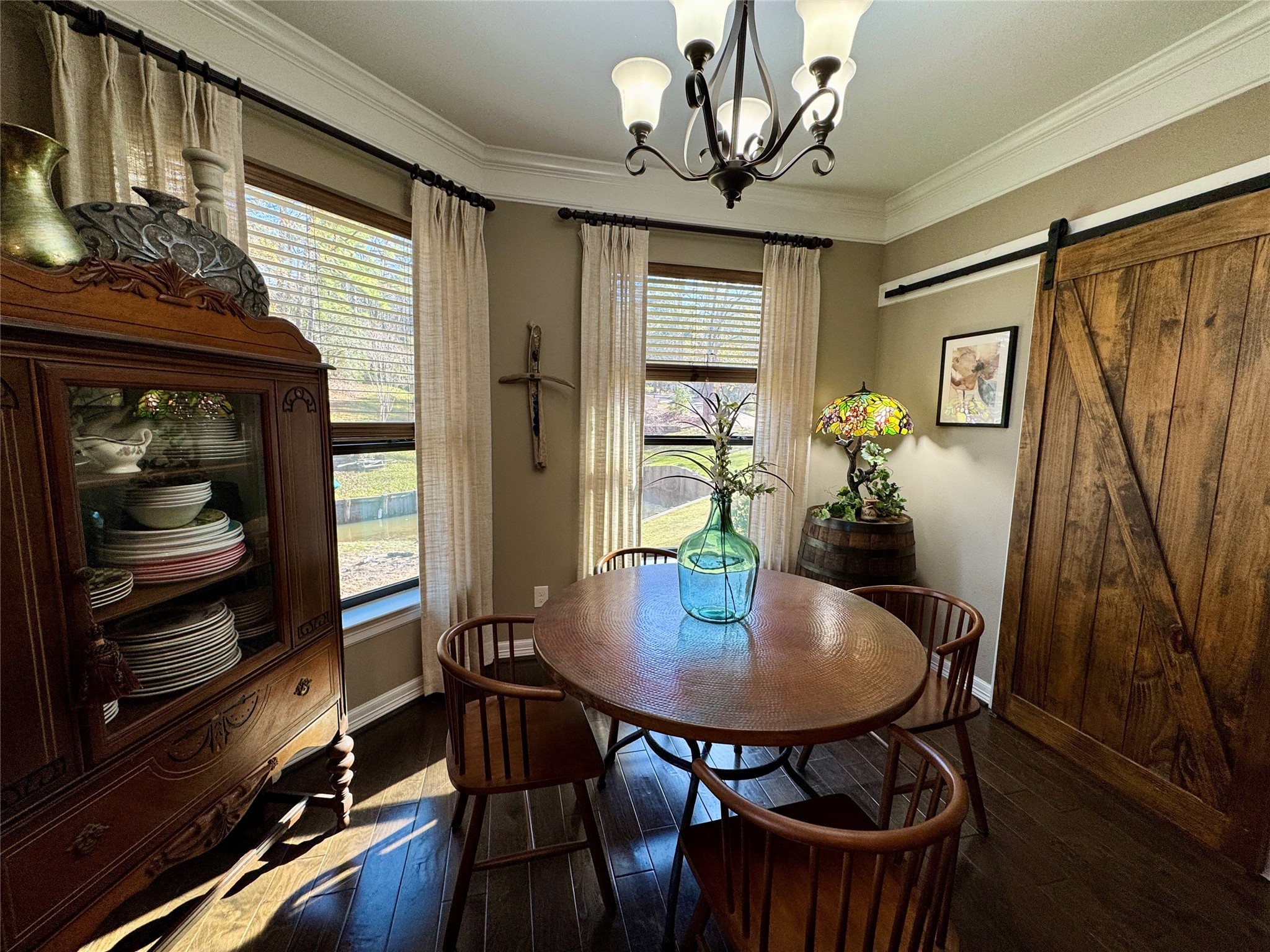 200 Harbor Run Drive Coldspring, TX 77331 - Photo 14 of 50 The dining area will hold a much larger table than this. They prefer to dine outside when possible and use this area more as a breakfast nook. Behind the stylish barn door is a fantastic utility room with ALL the things! See next 2 photos!