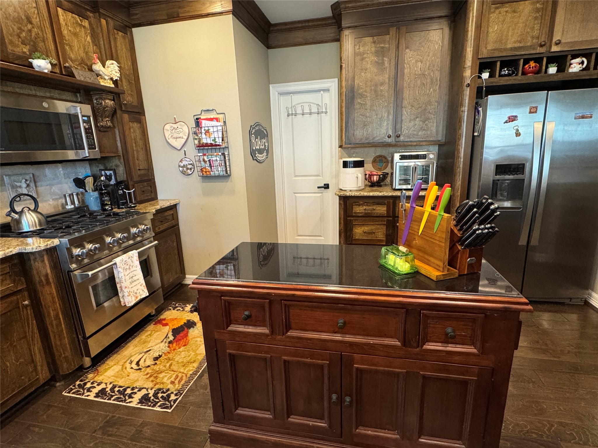 200 Harbor Run Drive Coldspring, TX 77331 - Photo 18 of 50 Island in the kitchen rolls so you can move it whenever you need to.