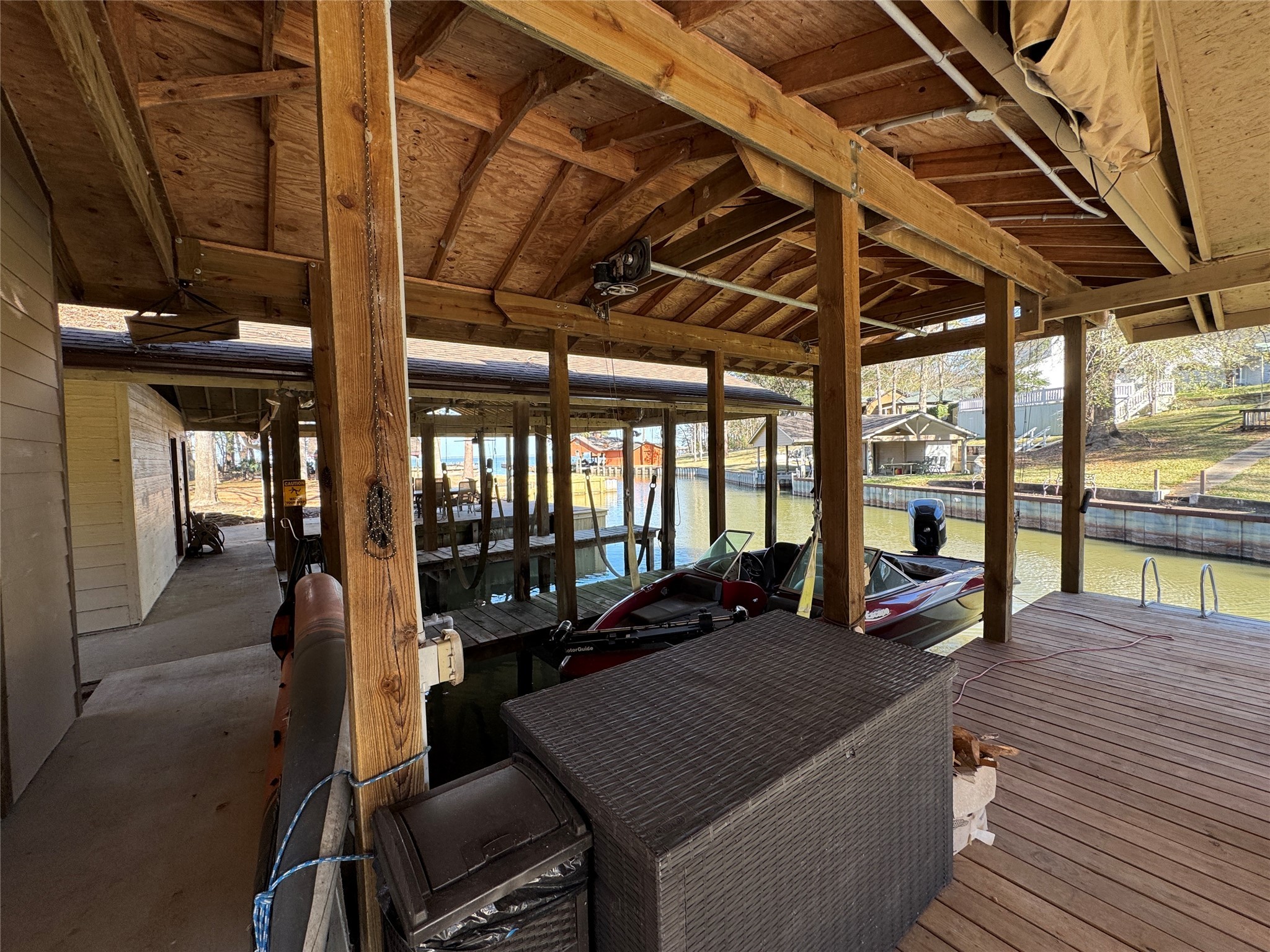 200 Harbor Run Drive Coldspring, TX 77331 - Photo 3 of 50 Boathouse with lift PLUS a covered patio next to it to gather and make memories!
