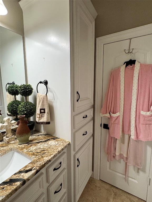200 Harbor Run Drive Coldspring, TX 77331 - Photo 33 of 50 a bathroom with a granite countertop sink a mirror and shower