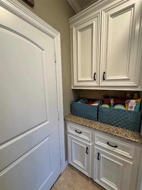 200 Harbor Run Drive Coldspring, TX 77331 - Photo 37 of 50 a kitchen with granite countertop white cabinets and sink