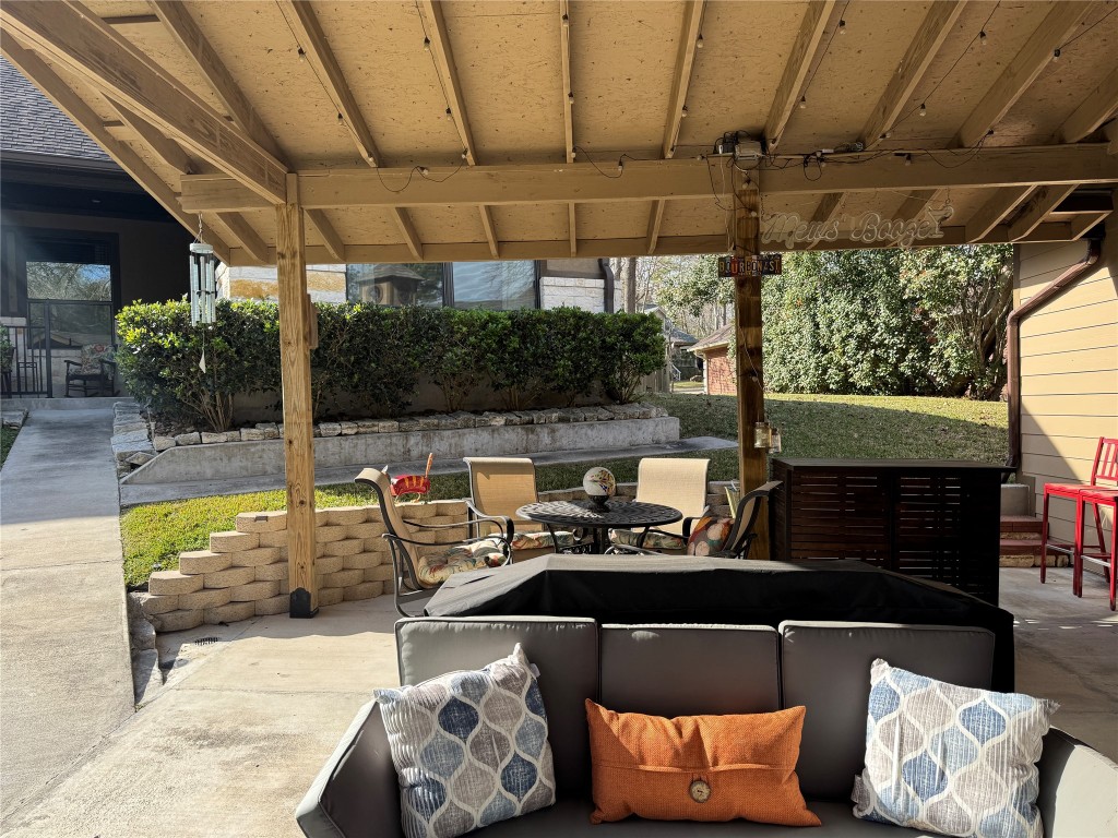 200 Harbor Run Drive Coldspring, TX 77331 - Photo 41 of 50 a outdoor space with patio furniture