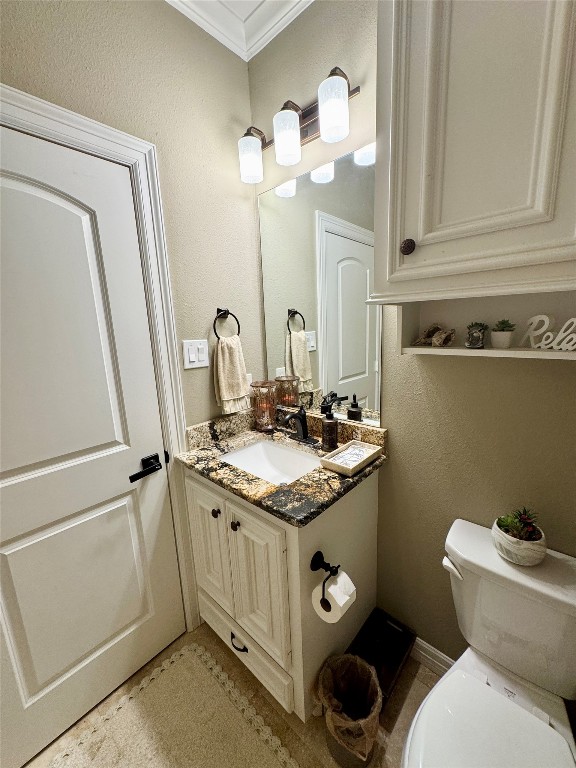 200 Harbor Run Drive Coldspring, TX 77331 - Photo 7 of 50 a bathroom with a granite countertop toilet sink and mirror