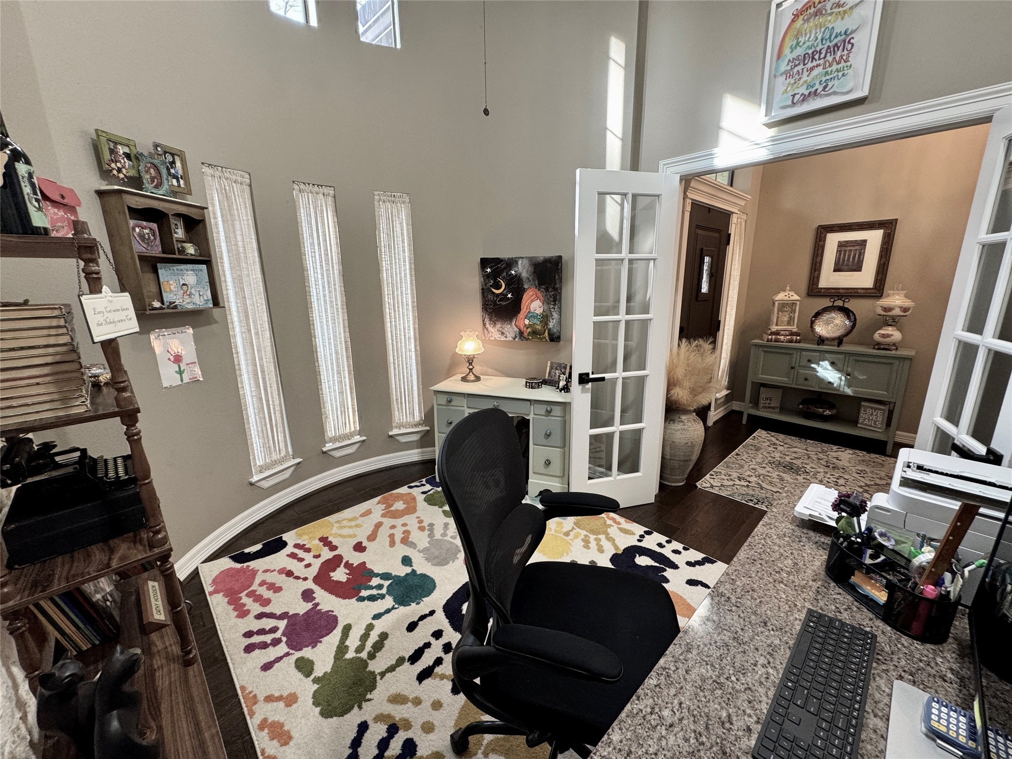 200 Harbor Run Drive Coldspring, TX 77331 - Photo 8 of 50 This inviting home office features high ceilings and ample natural light from tall windows. It is Ideal for a productive and inspiring work environment. If a home office is not a necessity for you, it would also make a fabulous music room, library, play room, or extra guest room. The possibilities are endless.