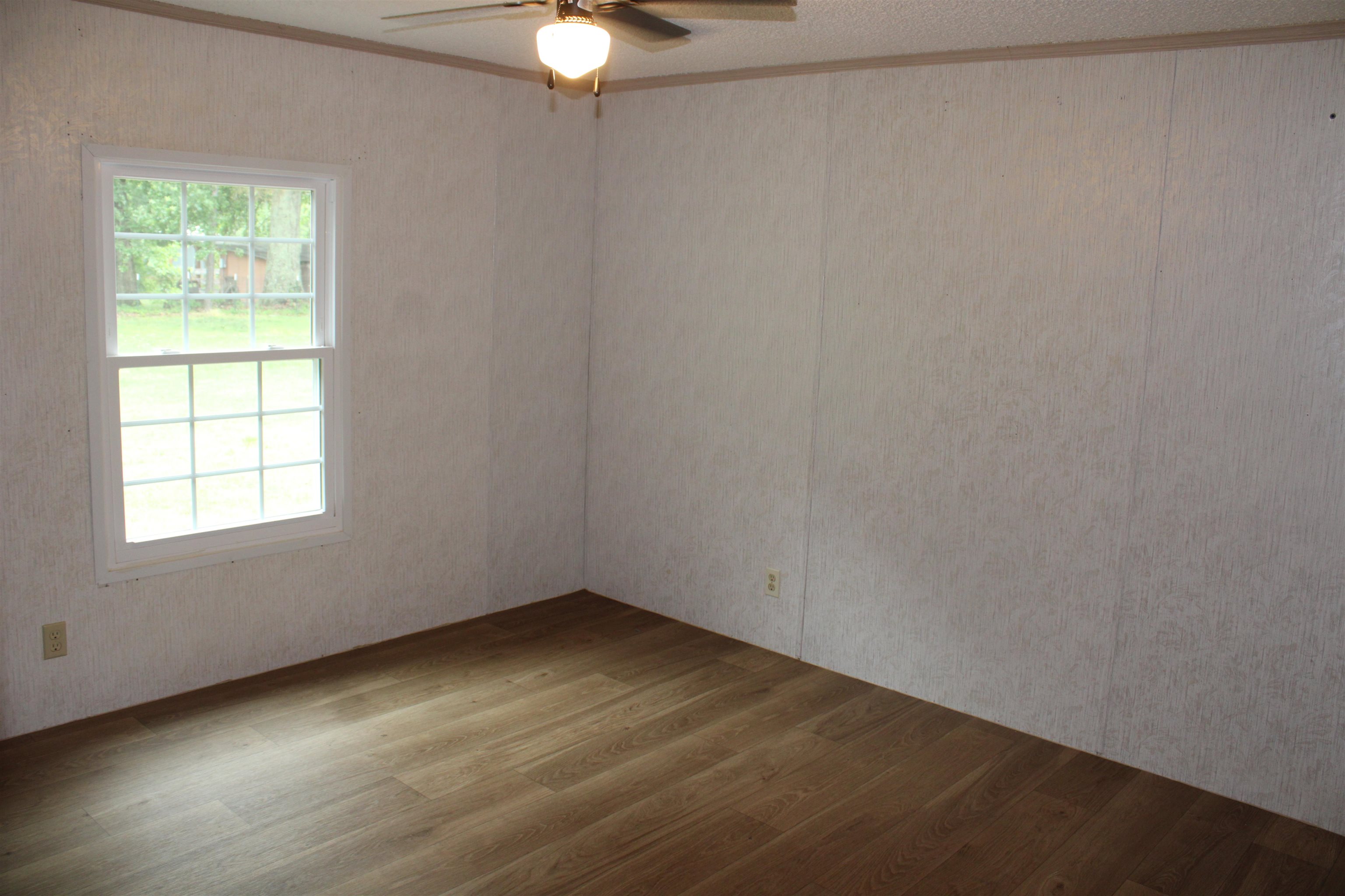 1660 Candy Owens Road Moscow, TN 38057 - Photo 12 of 14 an empty room with a window