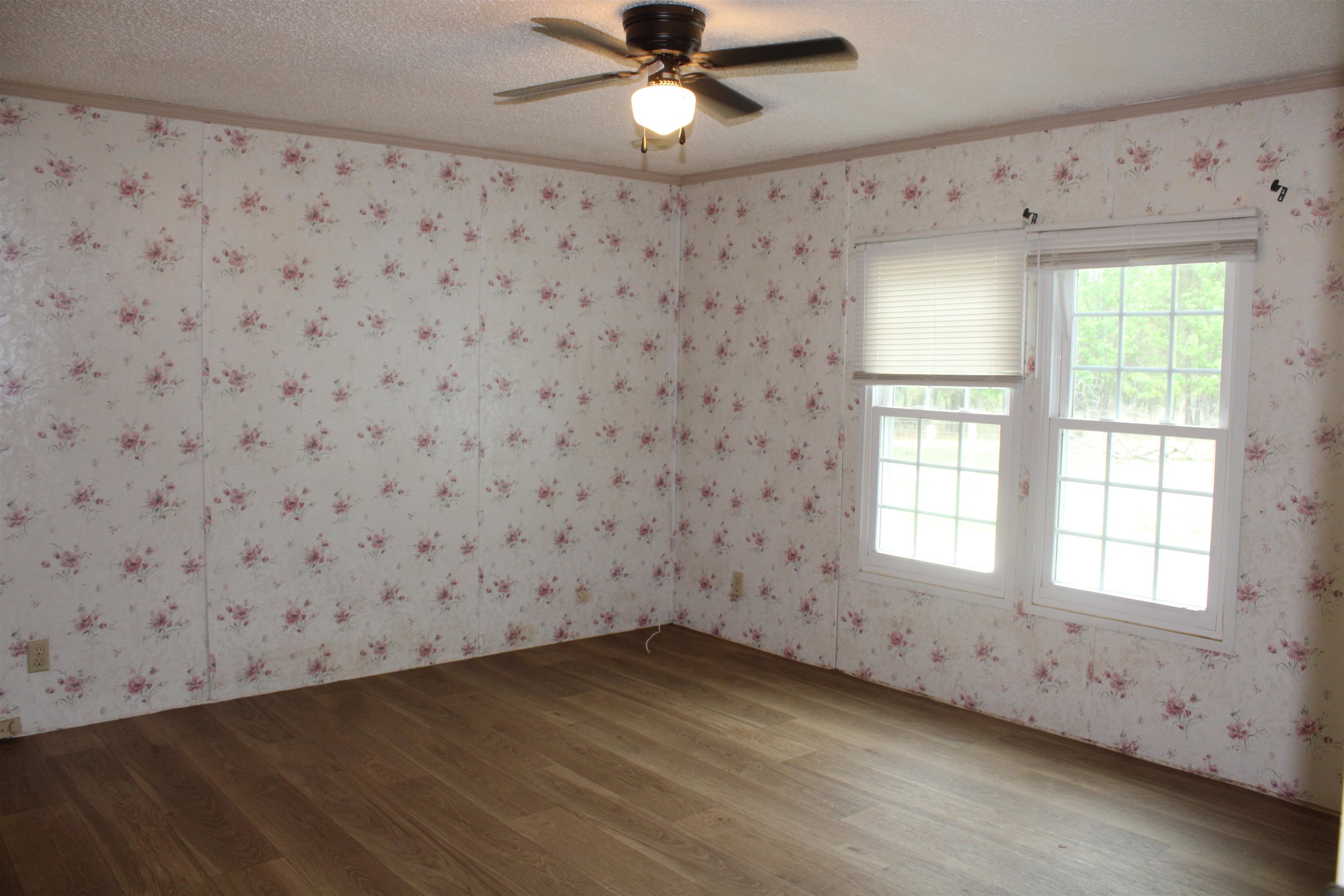 1660 Candy Owens Road Moscow, TN 38057 - Photo 6 of 14 a view of an empty room and window