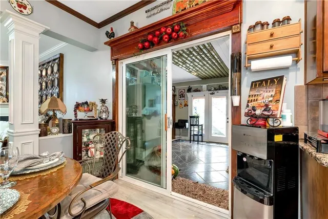 a view of a chairs and tables in a patio